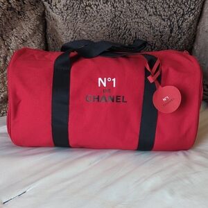 CHANEL N°1 Red Canvas Duffel Bag